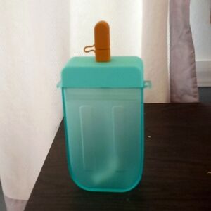Popsicle shaped water bottle with lanyard.